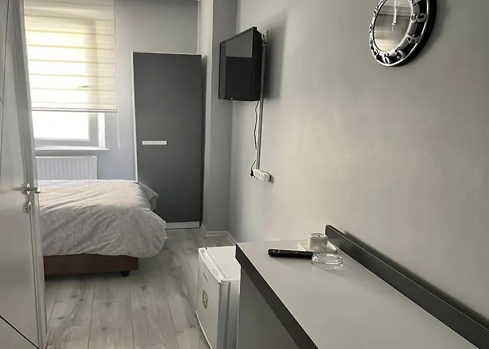 Hotel Grand White Suit